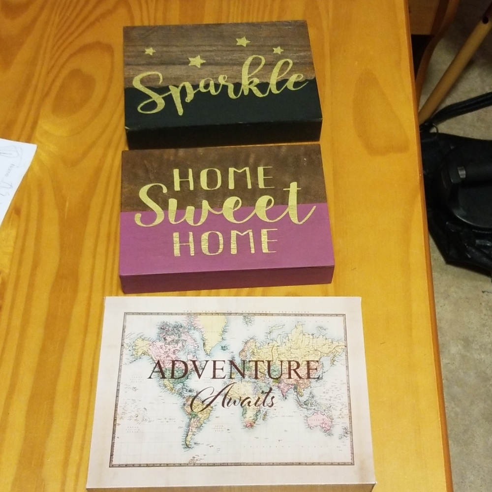3 wooden wall plaques
